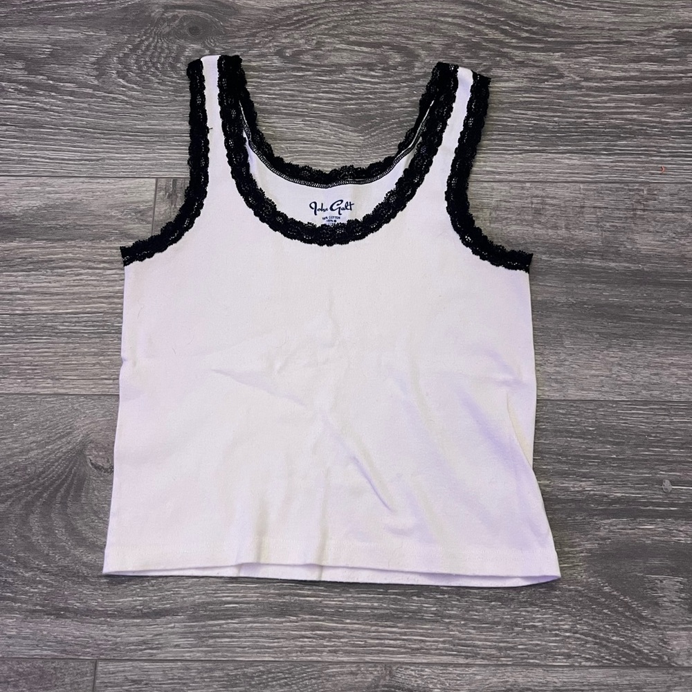Brandy Melville pink and black laced tank top.